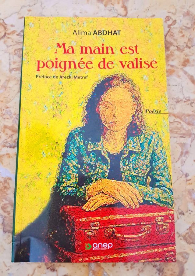 Ma main est poignée de valise d'Alima Abdhat